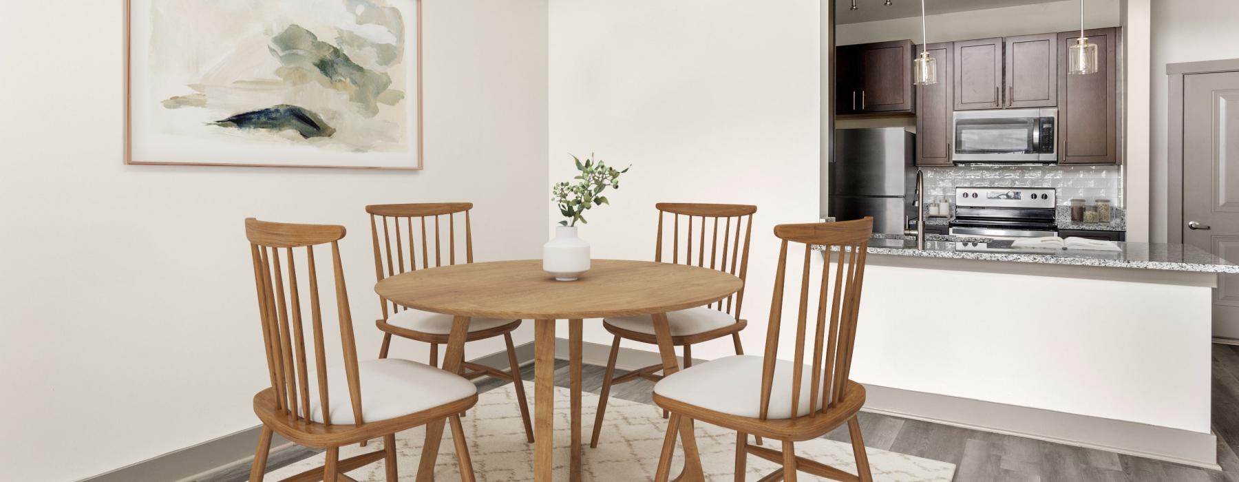 a dining room with a table and chairs