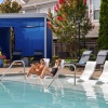 Two women and one man relaxing in the CityPark View Pool