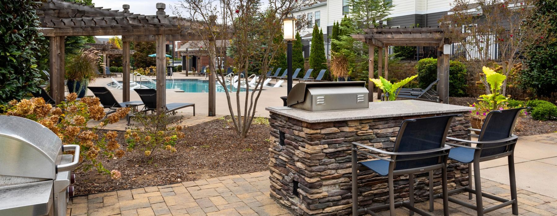 a patio with chairs and tables